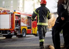 Photo of firefighters, photo by Adobe Stock